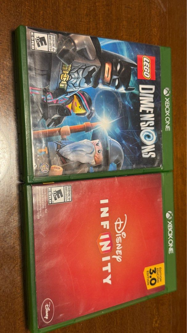 LEGO Dimensions & Disney Infinity 3.0 Xbox One Games (Category: Xbox) located in Quezon City. Submitted by abubut.atbp (Listing ID 1405153208, Image 1). Description: Two Xbox One games are available: LEGO Dimensions and Disney Infinity 3.0. Both games come with their original cases and discs..