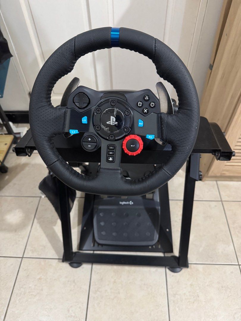 Logitech G29 Racing System with Stand (Category: Controllers) located in Mandaluyong City. Submitted by janelle.cabance (Listing ID 1405154167, Image 2). Description: FOR SALE! Price negotiable Compatible with: PlayStation 5,4,3 Powered USB port Windows® 11, Windows 10, Windows 8.1, Windows 8, Windows 7 Open to video call for demo. Location: Mandaluyong.