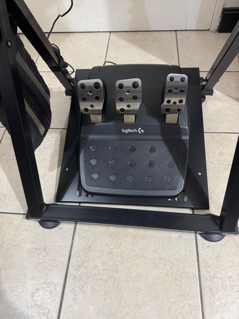 Logitech G29 Racing System with Stand (Category: Controllers) located in Mandaluyong City. Submitted by janelle.cabance (Listing ID 1405154167, Image 3). Description: FOR SALE! Price negotiable Compatible with: PlayStation 5,4,3 Powered USB port Windows® 11, Windows 10, Windows 8.1, Windows 8, Windows 7 Open to video call for demo. Location: Mandaluyong.