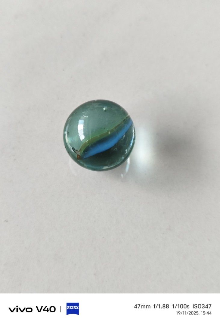 Marbles (Category: Kids Toys) located in Singapore. Submitted by skylerljc (Listing ID 1405046331, Image 3). Description: marbles comes in sets of 24 and comes with capsule. selling $2 for each set and all three for $5. interested parties please message me..