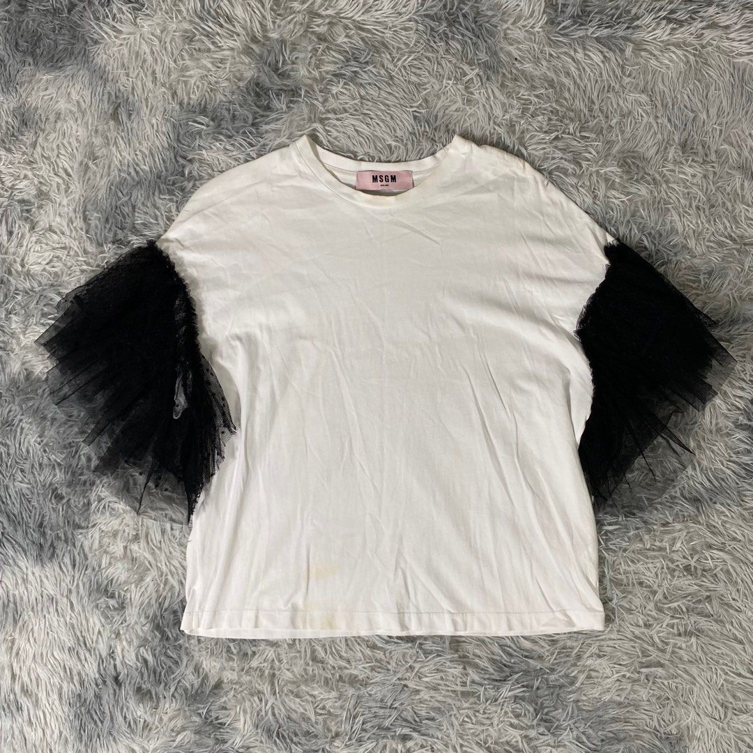 MSGM Net Polka dot Sleeve Tops (Category: Blouses) located in Las Pinas. Submitted by declutter_thing69 (Listing ID 1405066140, Image 2). Description: MSGM Net Polka dot Sleeve Tops Need wash 23 inches Length 21 inches Width.