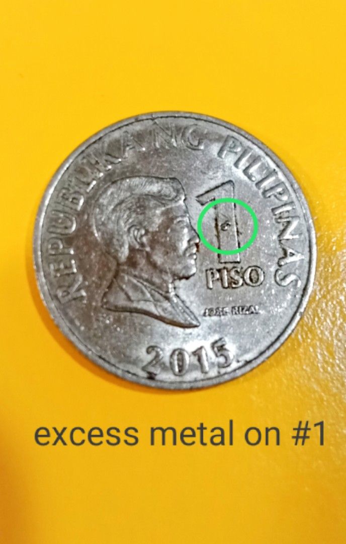 Philippine 1 Piso error coin 2015 (Category: Currency) located in Candon. Submitted by sniper_25 (Listing ID 1405100241, Image 1). Description: - Philippine 1 piso coin. - dated 2015 with excess metal on the number 1. - it is a coin with a reverse die III..