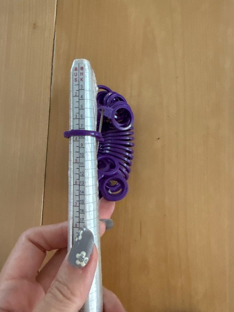 Ring Sizer Set - Adjustable Ring Sizing Tool (Category: Rings) located in Singapore. Submitted by khpf00 (Listing ID 1404978785, Image 2). Description: - Includes ring sizer stick and purple ring sizer gauges. - Accurately measure ring sizes. - Ring sizer stick with clear markings. - Gauges in various sizes. - Ideal for jewelry making or personal use..