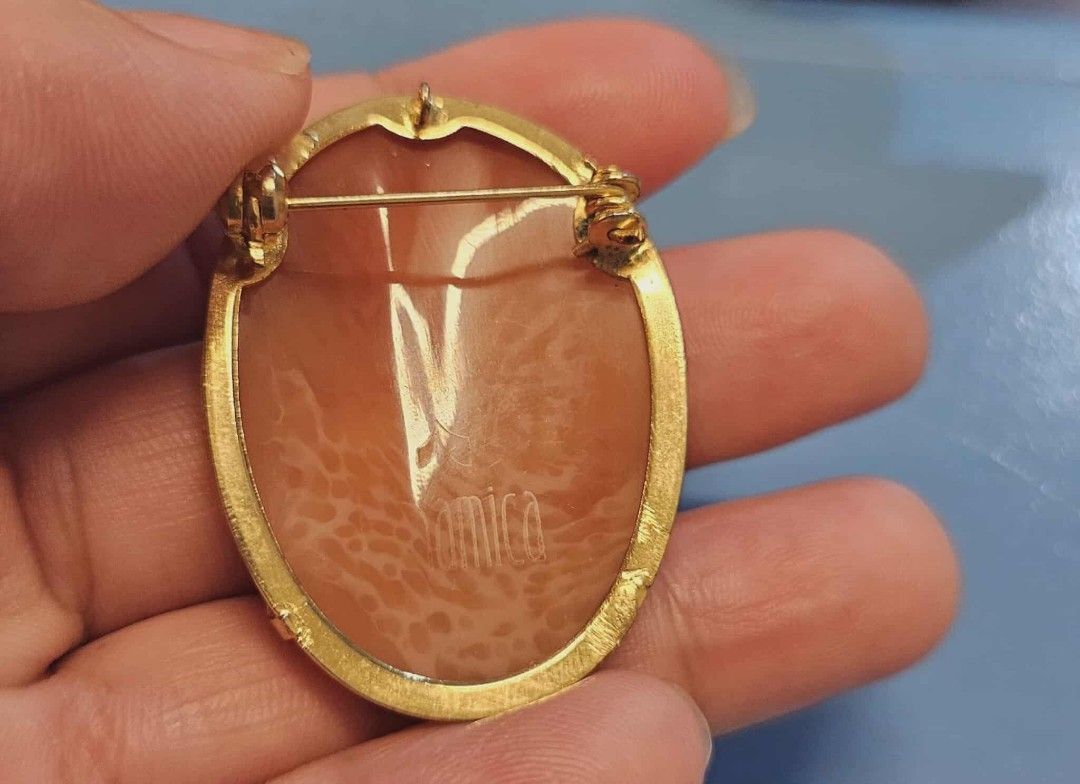 Shell cameo brooch with name at the back "Namica" (Category: Brooches) located in Dumaguete. Submitted by ellelopez35 (Listing ID 1405050130, Image 2). Description: .