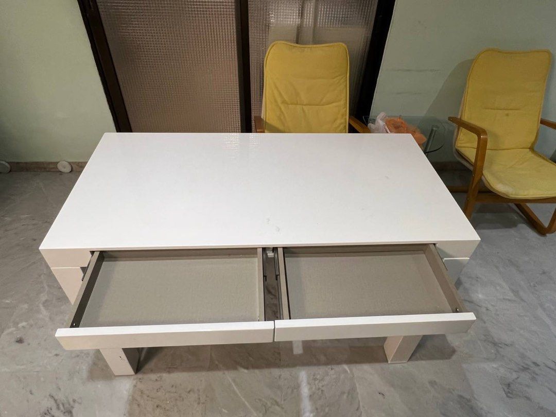 Study table (Category: Tables & Sets) located in Singapore. Submitted by aj_bikes (Listing ID 1405097402, Image 3). Description: - Sturdy white study table - Two drawers for storage - Smooth surface.
