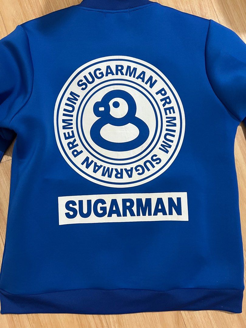 Sugarman Blue Jacket (Category: Coats, Jackets and Outerwear) located in Marikina City. Submitted by declutteringcarly (Listing ID 1405048592, Image 2). Description: - Blue Sugarman bomber jacket - Sugarman logo on front and back - Two front pockets - Ribbed collar and cuffs -expensive brand from - last price -can fit up to large men .