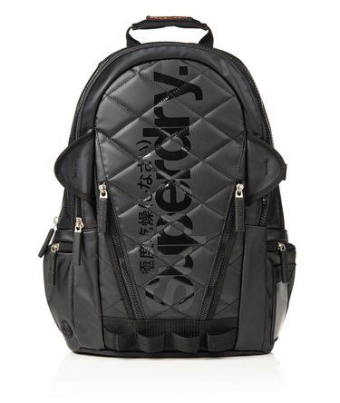 Superdry quilted Black Backpack authentic (Category: Backpacks) located in Manila. Submitted by welbern (Listing ID 1404994376, Image 1). Description: Minor scratches https://youtu.be/zo1DPgy9GIg?si=u45dYhibCb230IGL - Black Superdry backpack - Quilted front design - Multiple zippered compartments - Side pockets - Front pocket - Adjustable straps - Top handle - Superdry logo on front and back - Interior mesh pocket - Separate compartment.
