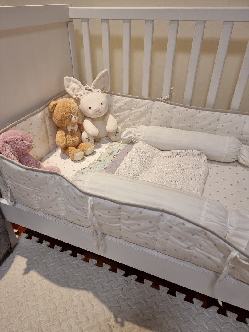 TAKE ALL IKEA White Baby Crib w/ Bedding Set (Category: Cots & Cribs) located in Quezon City. Submitted by rl_minimalist (Listing ID 1405100874, Image 1). Description: - White baby crib - Slatted side and solid end panels - Includes crib bumper and bedding - Convertible - Suitable for baby or toddler - Simple, clean design - Didnt use the crib and beddings Refer to other listings for details on crib and beddings.