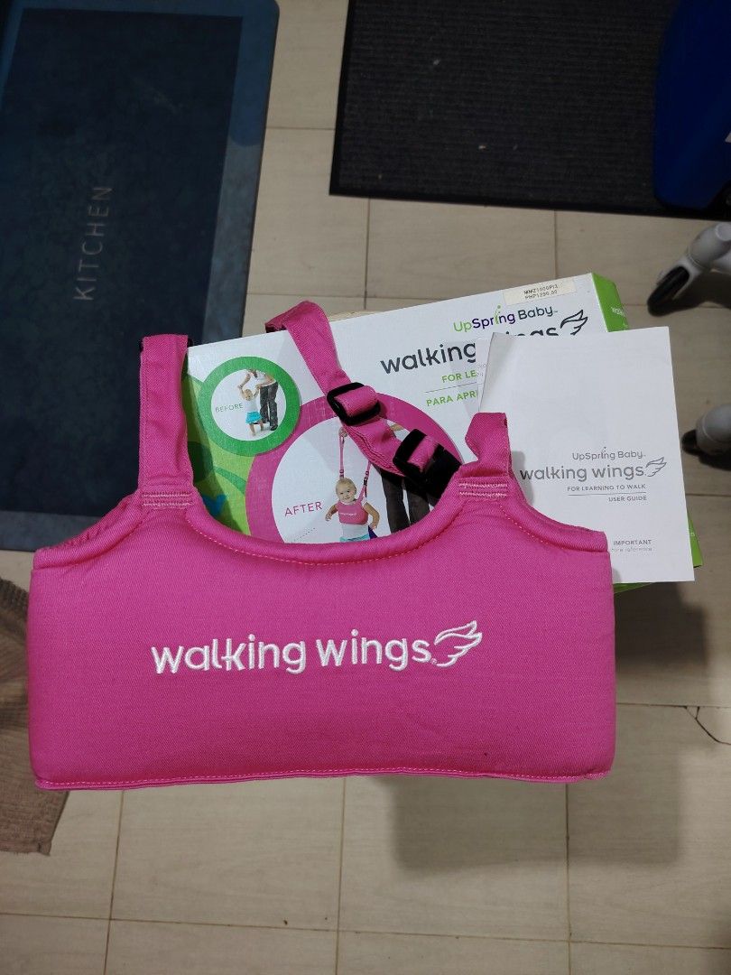 UpSpring Baby Walking Wings Pink (Category: Infant Playtime) located in Makati City. Submitted by jayclutter0976004 (Listing ID 1405086208, Image 2). Description: UpSpring Baby Walking Wings in pink, designed for learning to walk. It features a new, improved design for increased control for parents. It helps reduce falls for the baby, builds confidence, and reduces back pain for parents. Recommended for babies 6 months and up. It is soft, comfort
