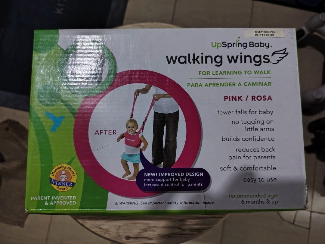 UpSpring Baby Walking Wings Pink (Category: Infant Playtime) located in Makati City. Submitted by jayclutter0976004 (Listing ID 1405086208, Image 1). Description: UpSpring Baby Walking Wings in pink, designed for learning to walk. It features a new, improved design for increased control for parents. It helps reduce falls for the baby, builds confidence, and reduces back pain for parents. Recommended for babies 6 months and up. It is soft, comfort