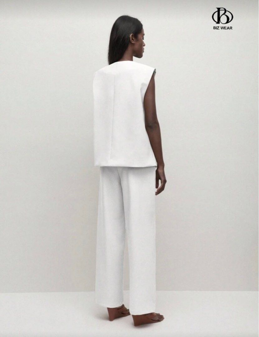 White Blazer Vest and Pants Set (Category: Sets or Coordinates) located in Quezon City. Submitted by pgv18 (Listing ID 1405125720, Image 3). Description: Like new condition Suitable for work or casual wear Thick material Double lined .
