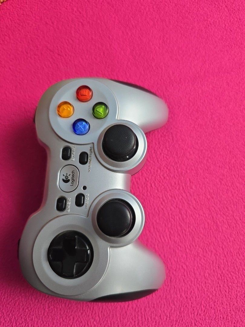 Wireless controller (Category: Controllers) located in Singapore. Submitted by reprat (Listing ID 1405033168, Image 1). Description: Logitec wireless controller rarely used as kids used the x box controller alone.