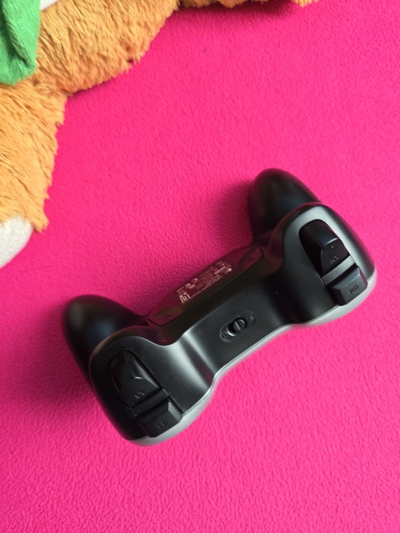 Wireless controller (Category: Controllers) located in Singapore. Submitted by reprat (Listing ID 1405033168, Image 2). Description: Logitec wireless controller rarely used as kids used the x box controller alone.