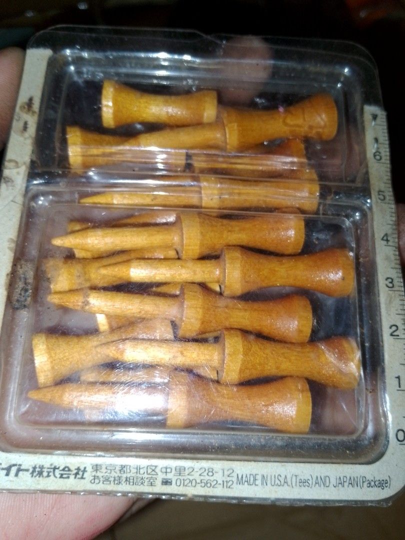Wooden Golf Tees (Category: Golf) located in Cardona. Submitted by nick_and_maria (Listing ID 1405070694, Image 2). Description: - 15pcs - Pack of wooden golf tees - Made in USA and Japan - Includes a yellow and clear plastic container - Light brown color - Multiple tees per pack.