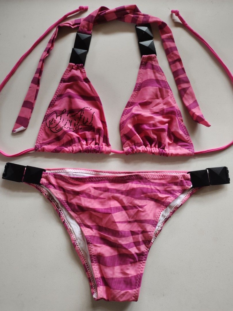 [sold] Affliction Sinful Pink Zebra Print Bikini Set (Category: Bikinis & Swimsuits) located in Cebu City. Submitted by crispyfri3dchicken (Listing ID 1401796717, Image 2). Description: - Pink zebra print bikini set - Triangle top with studded accents - Adjustable straps for a comfortable fit - Matching bottom with black waist accent - Size: M.