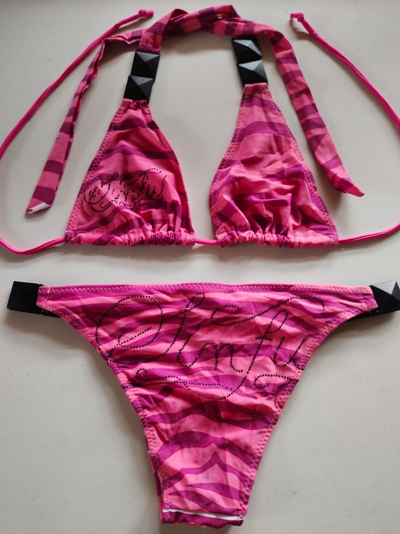 [sold] Affliction Sinful Pink Zebra Print Bikini Set (Category: Bikinis & Swimsuits) located in Cebu City. Submitted by crispyfri3dchicken (Listing ID 1401796717, Image 1). Description: - Pink zebra print bikini set - Triangle top with studded accents - Adjustable straps for a comfortable fit - Matching bottom with black waist accent - Size: M.
