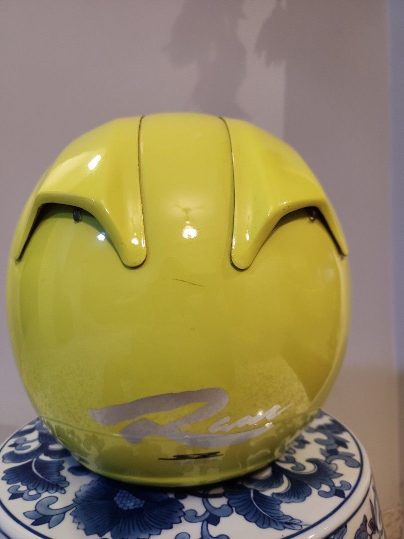 Arai Ram 1 helmet (Category: Motorcycle Accessories) located in Singapore. Submitted by wasupmersibles (Listing ID 1401798677, Image 3). Description: Arai Ram 1. Repainted to floro yellow (New). New headliner. Storage marks only. Size M. .