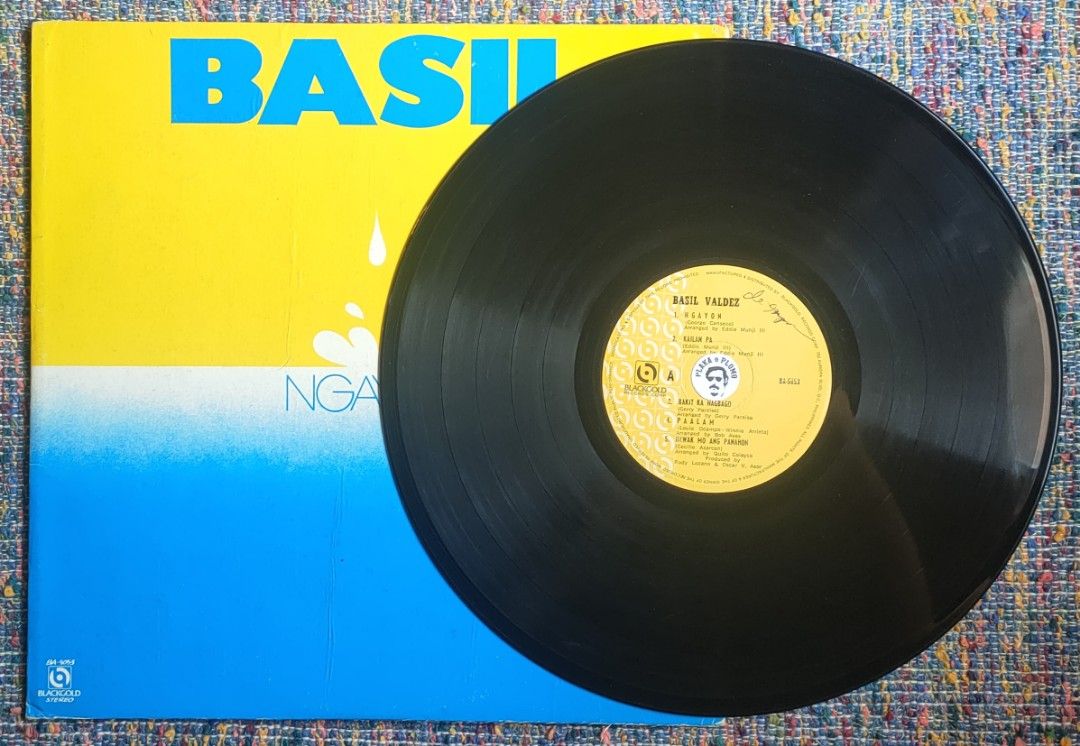 Basil Valdez - Ngayon LP Vinyl Record (Category: Vinyls) located in Quezon City. Submitted by plaka.o.plomo (Listing ID 1401808731, Image 3). Description: Artist(s) : Basil Valdez Album : Ngayon Year : 1979 Media : VG Color : Black Sleeve : VG+ No. : 1x Vinyl Size : 12" RPM : 33 Country : Philippines Catalog No. : BA-5053 Tracklist : - Side A 1. Ngayon 2. Kailan Pa 3. Bakit Ka Nagbago 4. Paalam 5. Hawak Mo Ang Panahon - Side B 1. Iduyan Mo 2. Siy
