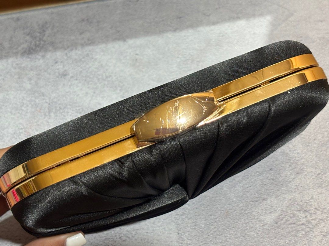 Black Satin Clutch with Gold Hardware (Category: Clutches) located in San Jose. Submitted by sharpcartoonist (Listing ID 1401865852, Image 3). Description: BRAND NEW Material: Artificial Silk Fabric texture: Satin Lining texture: Polyester Opening method: Lock Number of shoulder straps: Single Color: black with gold hardware Size: 20.5cm * 6cm * 13cm Bought this for: ₱724 RFS: Item arrived late too for the event. .