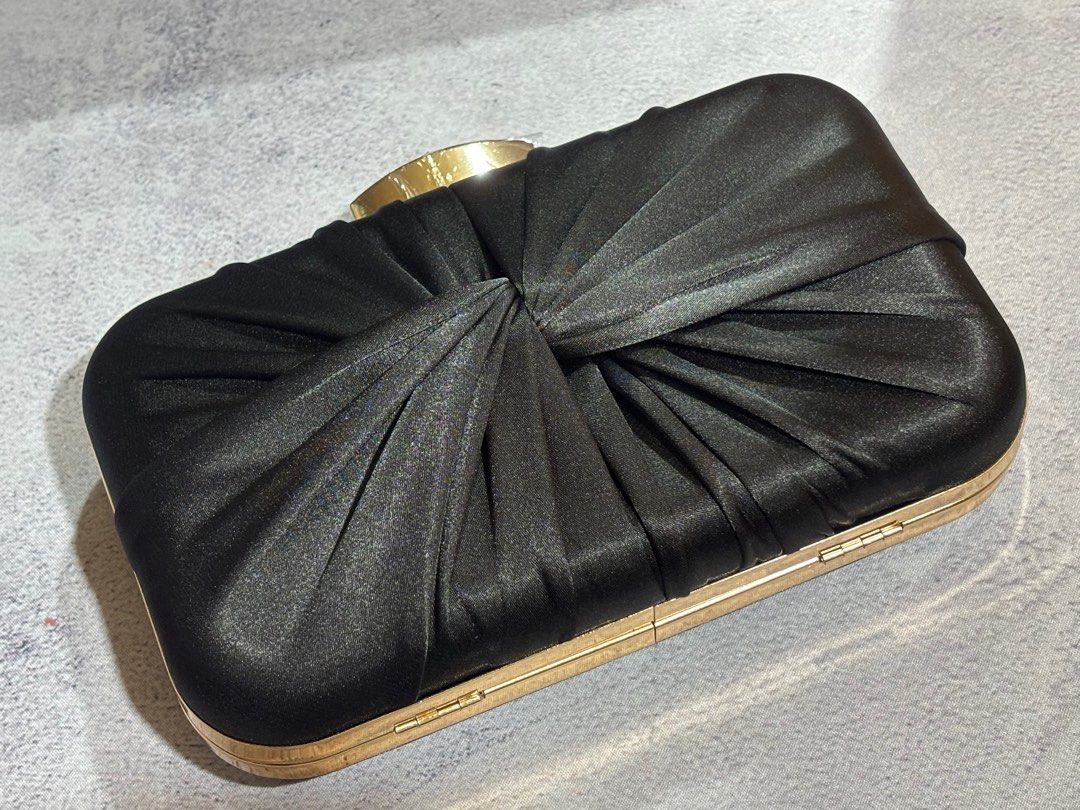 Black Satin Clutch with Gold Hardware (Category: Clutches) located in San Jose. Submitted by sharpcartoonist (Listing ID 1401865852, Image 2). Description: BRAND NEW Material: Artificial Silk Fabric texture: Satin Lining texture: Polyester Opening method: Lock Number of shoulder straps: Single Color: black with gold hardware Size: 20.5cm * 6cm * 13cm Bought this for: ₱724 RFS: Item arrived late too for the event. .