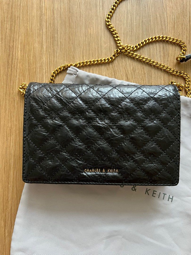 Charles and Keith clutch bag w/ chain (Category: Clutches) located in Manila. Submitted by ayisssh (Listing ID 1401757701, Image 2). Description: .
