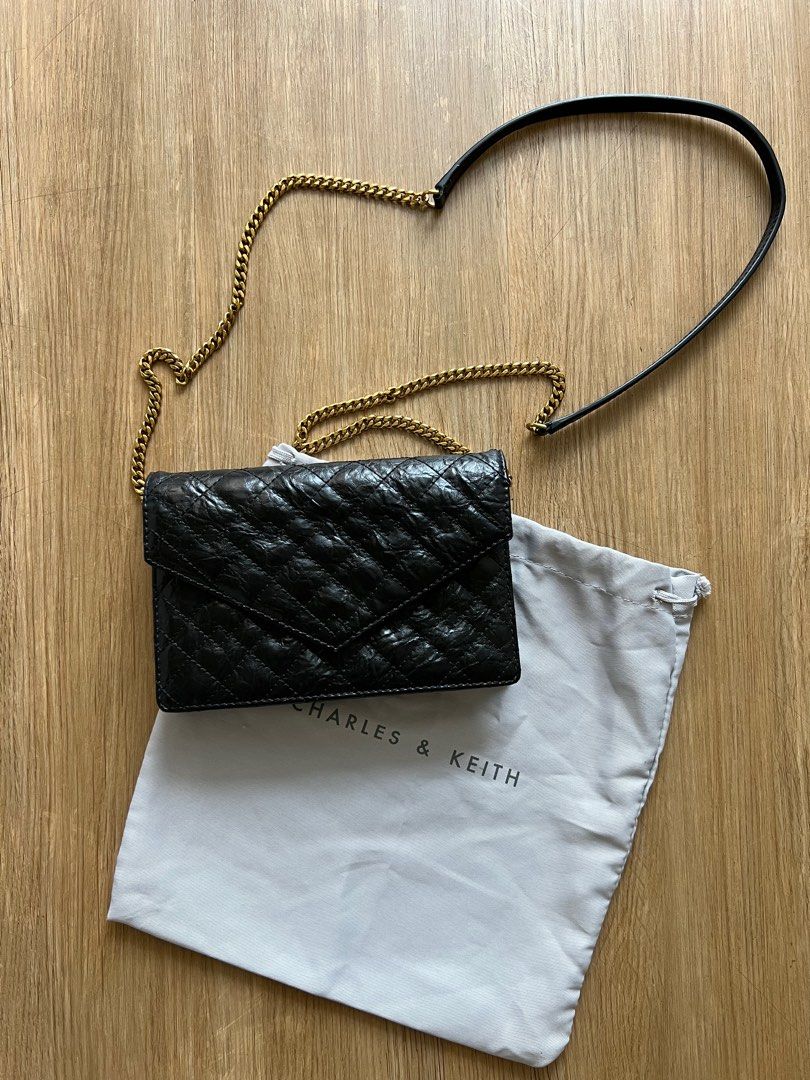 Charles and Keith clutch bag w/ chain (Category: Clutches) located in Manila. Submitted by ayisssh (Listing ID 1401757701, Image 3). Description: .