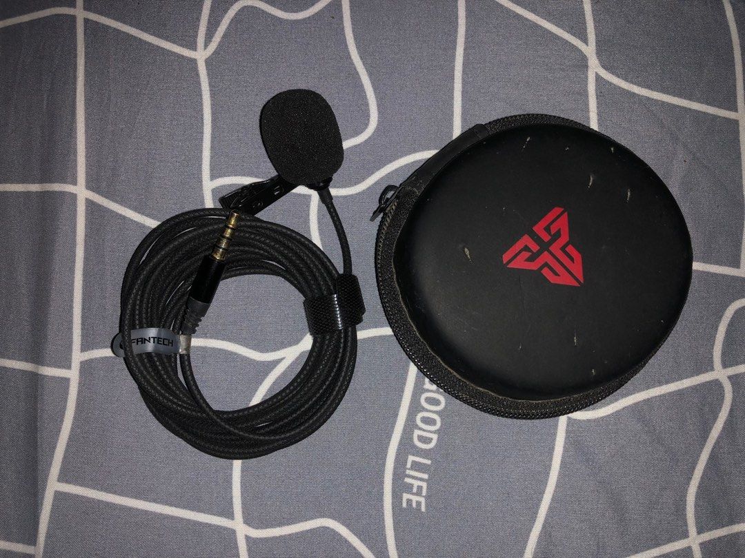 Fantech MV-01 Lavalier Microphone for Phone, Laptop (Category: Microphones) located in Mandaluyong City. Submitted by carbonarugh (Listing ID 1401730281, Image 1). Description: Fantech MV01 Lavalier Microphone for Phone, Laptop, & PC (Noise Reduction) P150 *used saglit lang since di na naka-wfh *no issue, fully working tinest ko ulit sa phone ko at laptop yung hard case nya lang may ngatngat ng cat ko 🥹 COMPATIBLE WITH: Mobile Phone DSLR Cameras
