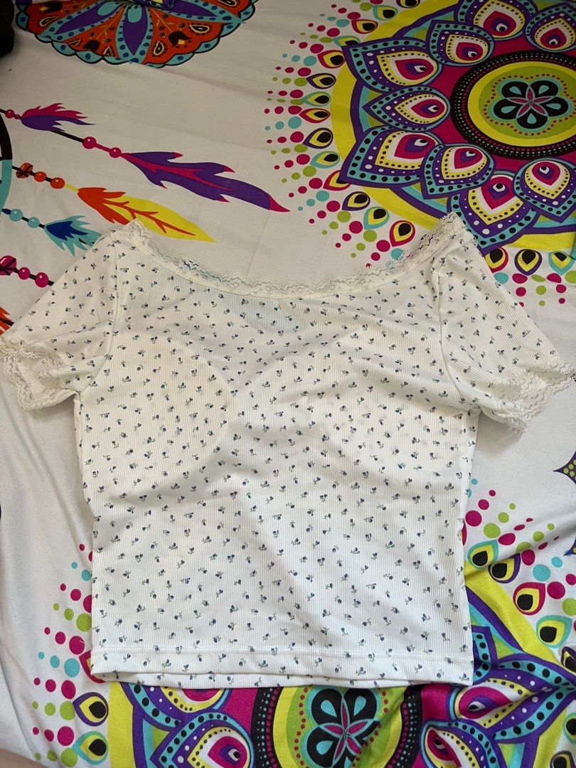 Floral Lace Trim Top (Category: Blouses) located in Paranaque City. Submitted by rieclutter (Listing ID 1401756898, Image 2). Description: - can fit xs-m - Floral patterned top - Lace trim detail - Tie detail at bust - Short sleeves - Scoop neckline - Ribbed fabric.