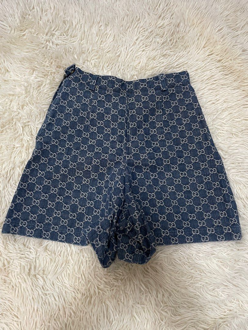 Gucci Denim Shorts with Leather Detailing (Category: Shorts) located in Manila. Submitted by arsunethloub (Listing ID 1401765738, Image 2). Description: - Authentic Gucci denim shorts - Features iconic GG monogram - Zip closure - Leather detailing on back pockets - Made in Italy - Size 36 - Classic design - Perfect for a designer look.