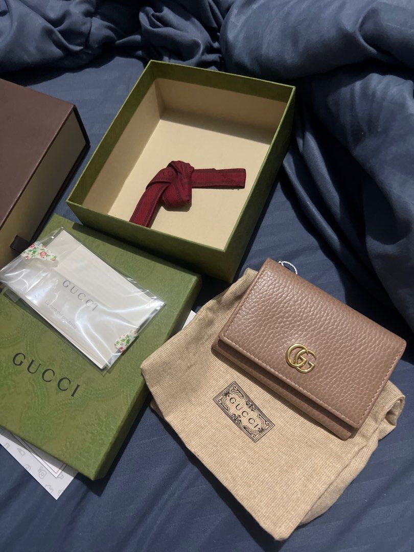 Gucci GG Marmont Compact wallet (Category: Luxury Bags & Wallets) located in Quezon City. Submitted by hvamom (Listing ID 1401736554, Image 1). Description: Trifold with coin purse zipper beige pink color complete tag box dustbag pm for photos if interested Rfs: need cash for my son therapy .