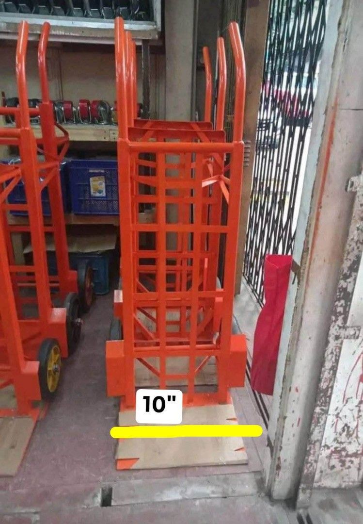 Heavy Duty Hand Truck (Category: Construction Tools & Equipment) located in Manila. Submitted by brightstar.b55721 (Listing ID 1401751023, Image 3). Description: Durable hand truck for easy moving. Sturdy orange frame with 10-inch base and two wheels. Handles heavy loads. 220lbs load capacity COD FREE DELIVERY IN METRO MANILA AVAILABLE SIZE: 6" 8" 10" 12".