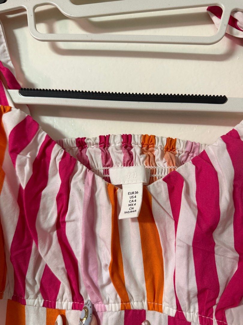 H&M Striped Midi Dress (Category: Dresses) located in Muntinlupa City. Submitted by declutterwithksgs (Listing ID 1401775057, Image 3). Description: Brand: H&M Size: 36/S but fits M to Large - Adjustable Straps - Good coverage for bust - Perfect for Beach days - Has a minor problem with the zipper but not noticeable when worn Buyer must cover for shipping expenses Mode of payment: BDO or GCash .