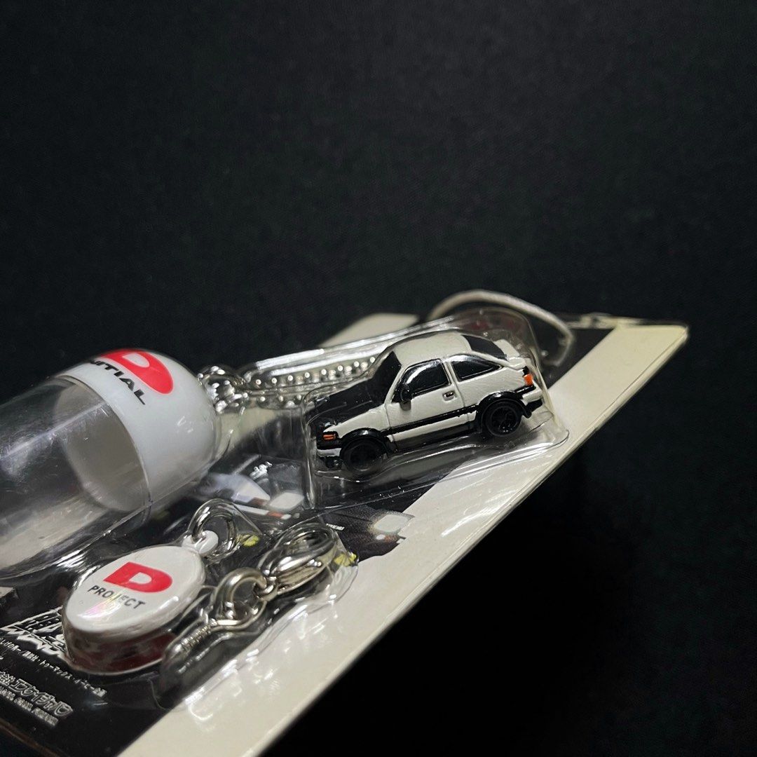 Initial D AE86 trueno keychain capsule anime anik (Category: Character Goods) located in Davao. Submitted by a27v5qvh (Listing ID 1401731350, Image 2). Description: takumi fujiwara.