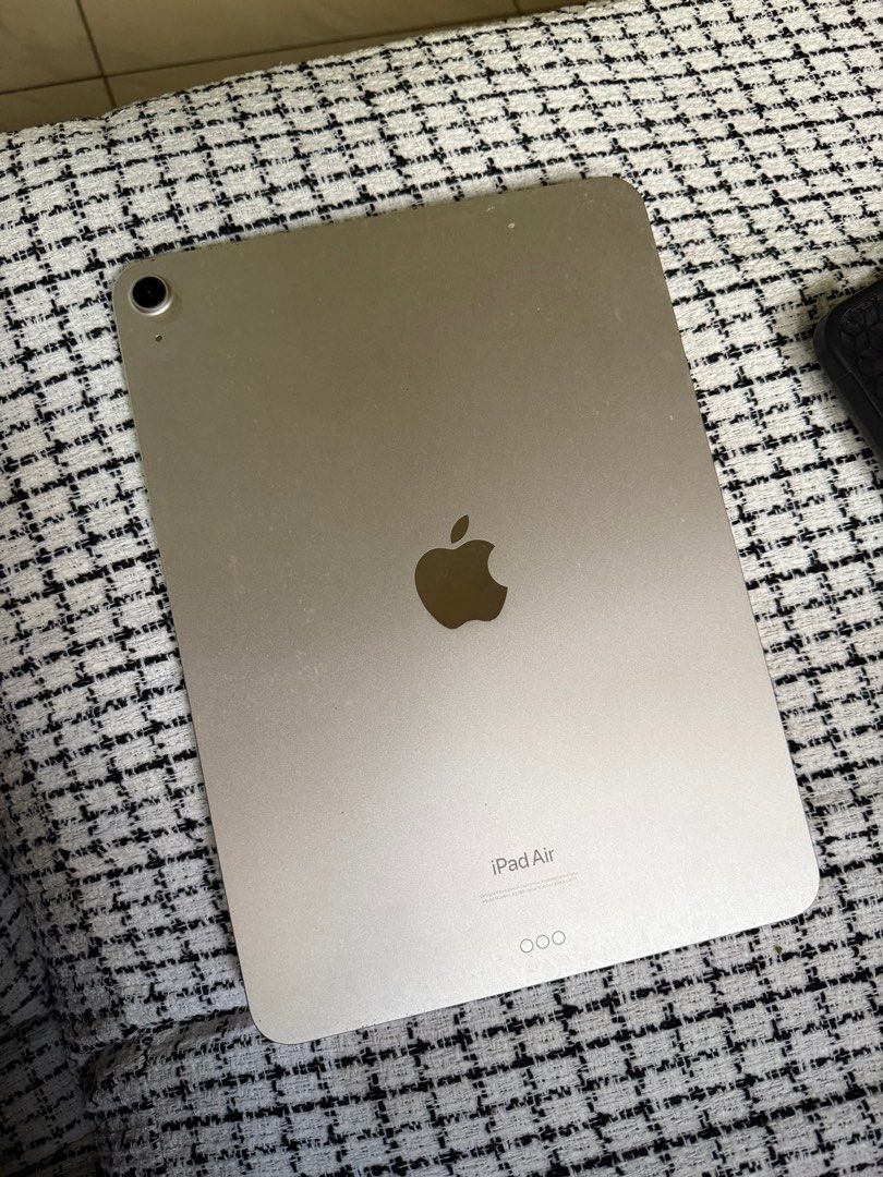 iPad Air, 5th Gen, w/ Apple Pencil and box (Category: iPad) located in Manila. Submitted by rvm715 (Listing ID 1401725401, Image 2). Description: - iPad Air 5th Gen - starlight - Includes pen and box - 64GB storage - Available for meetups in Pampanga and Ortigas, Pasig - mostly used only for note taking / journaling - pristine condition HONEST issues - apple pencil 2nd gen - as seen in the photo, my cat bit the pen, noticeable marks siya but can 