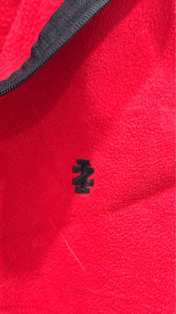 IZOD Red Fleece Vest (Category: Vests) located in Taguig. Submitted by rizacarza (Listing ID 1401897739, Image 2). Description: IZOD vest is a vibrant red color. It features a full zipper closure and a black trim along the collar and armholes. The IZOD logo is visible on the chest. The vest is made in Jordan. It has a size S/P..