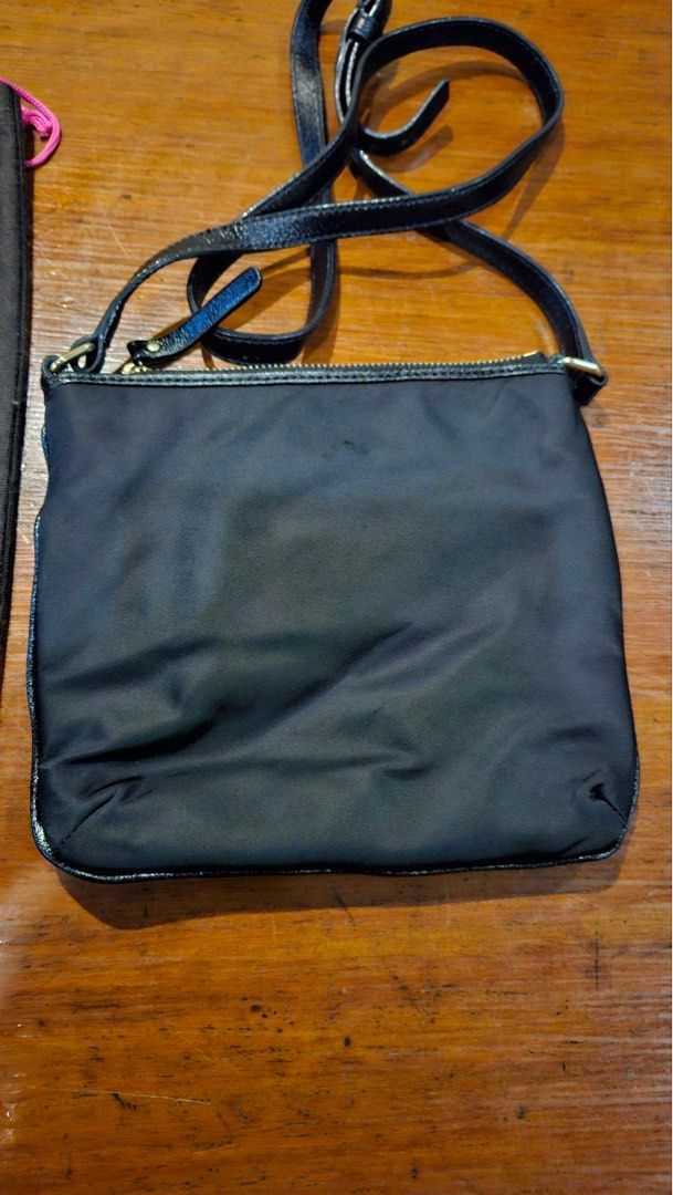 Kate Spade Black Crossbody Bag (Category: Cross-body Bags) located in Quezon City. Submitted by indy37 (Listing ID 1401795596, Image 2). Description: - Black Kate Spade crossbody bag - Gold zipper - Black strap - Includes dust bag .