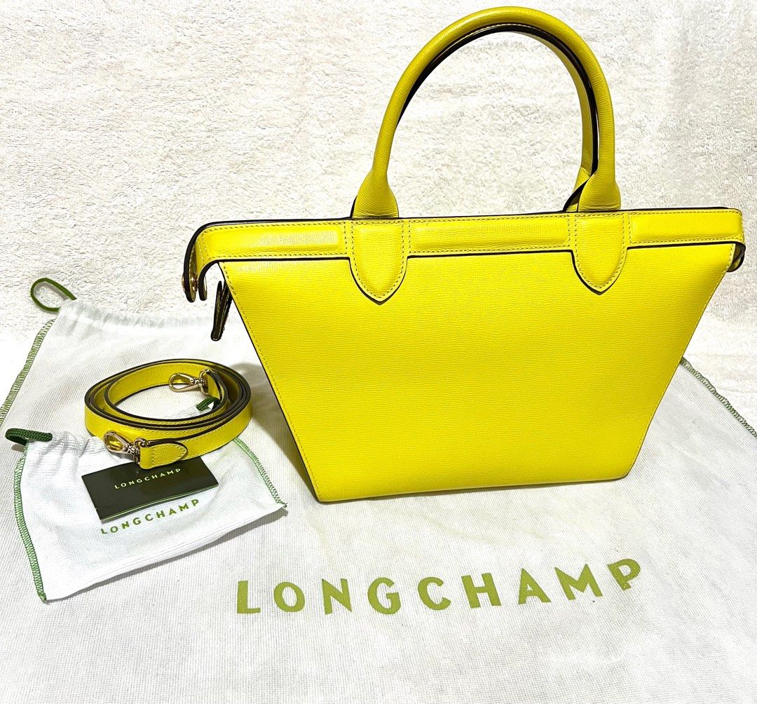 Longchamp Le Pliage Heritage Tote Leather Handbag (Category: Luxury Bags & Wallets) located in Quezon City. Submitted by thefringe (Listing ID 1401846719, Image 2). Description: Price is negotiable. Guaranteed authentic. Bought it around 50k at Rustan’s. Complete with dust bags (bag and strap), care card and strap..