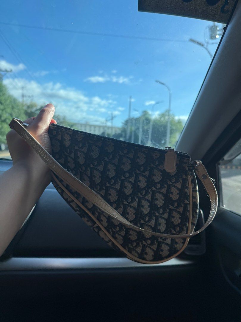 Mini Diorissimo Coated Canvas Saddle Pochette (Category: Luxury Bags & Wallets) located in Bulacan. Submitted by f_bags (Listing ID 1401865566, Image 3). Description: Dior 2001 Mini Diorissimo Coated Canvas Saddle Pochette by Galliano Flaws as pictured Needs cleaning No functional damage No rips/tears on inner lining .