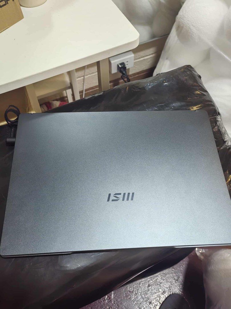 MSI Modern 14 UltraBook 14 (Category: Laptops & Notebooks) located in Kawit. Submitted by markuzmathers (Listing ID 1401856416, Image 1). Description: For sale MSI Modern 14 B11MOU Tiger Lake Intel Core I3 1115G4 11Th Gen 3.00Ghz 14” FHD IPS Up To Intel Iris XE Graphics 8Gb DDR4 3200MHz Max Up To 64Gb 256Gb Nvme SSD Gen4 HD Webcam Single (White) Backlit Keyboard Wifi 6 /Bluetooth 5.1 1x Mic In / Headphone-out Combo Jack 2x Type-A Usb 3.2 Gen 1 Mi