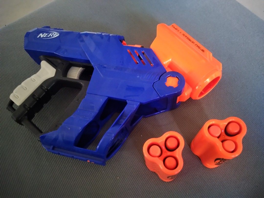 Nerf Shellstrike DS-6 Blaster (Category: Action & Battle Toys) located in Las Pinas. Submitted by willcatud (Listing ID 1401717594, Image 2). Description: FOR SALE: Nerf Shellstrike DS-6 Blaster READ ALL DETAILS. I WILL IGNORE PMs THAT ASK QUESTIONS ANSWERABLE BY THIS POST. - in PRISTINE condition - never fielded in any Nerf war; just used as a plinker - includes the 2 original shells that came with it (and extra darts) RFS: retired from Nerf; al