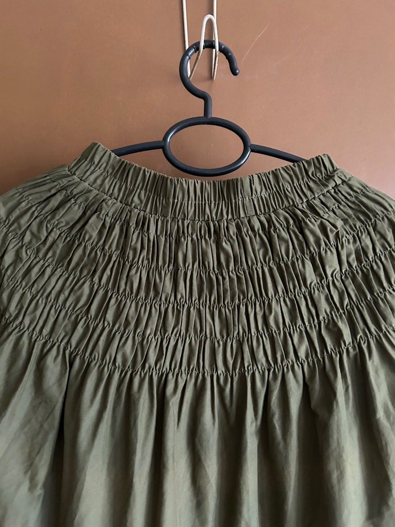 Olive Green Smocked Maxi Skirt (Category: Skirts) located in Manila. Submitted by anothermanxtreasure (Listing ID 1401822701, Image 2). Description: Suede like fabric, a nice deep autumnal color Fits XS-Semi Medium (stretchy but fit won’t be loose) Giving Copenhagen girlie with a high neck coat.
