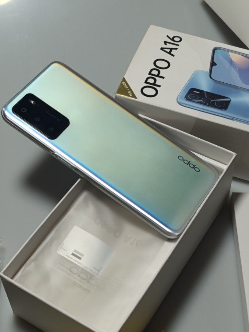 Oppo A16 Lightly used backup phone (Category: OPPO) located in Manila. Submitted by cherrylim93 (Listing ID 1401814880, Image 3). Description: [AUTHENTIC] Oppo A16 Complete with Box Complete Brand New Accessories 2 extra casing, Bluelight Shield Installed 5000mAh Long-lasting Battery 4G LTE Height: about 163.8mm Width: about 75.6mm Thickness: about 8.4mm Weight: about 190g Model: A16, CPH2269 Space Silver (Iridescent) 2 Sim Slots, External Memory