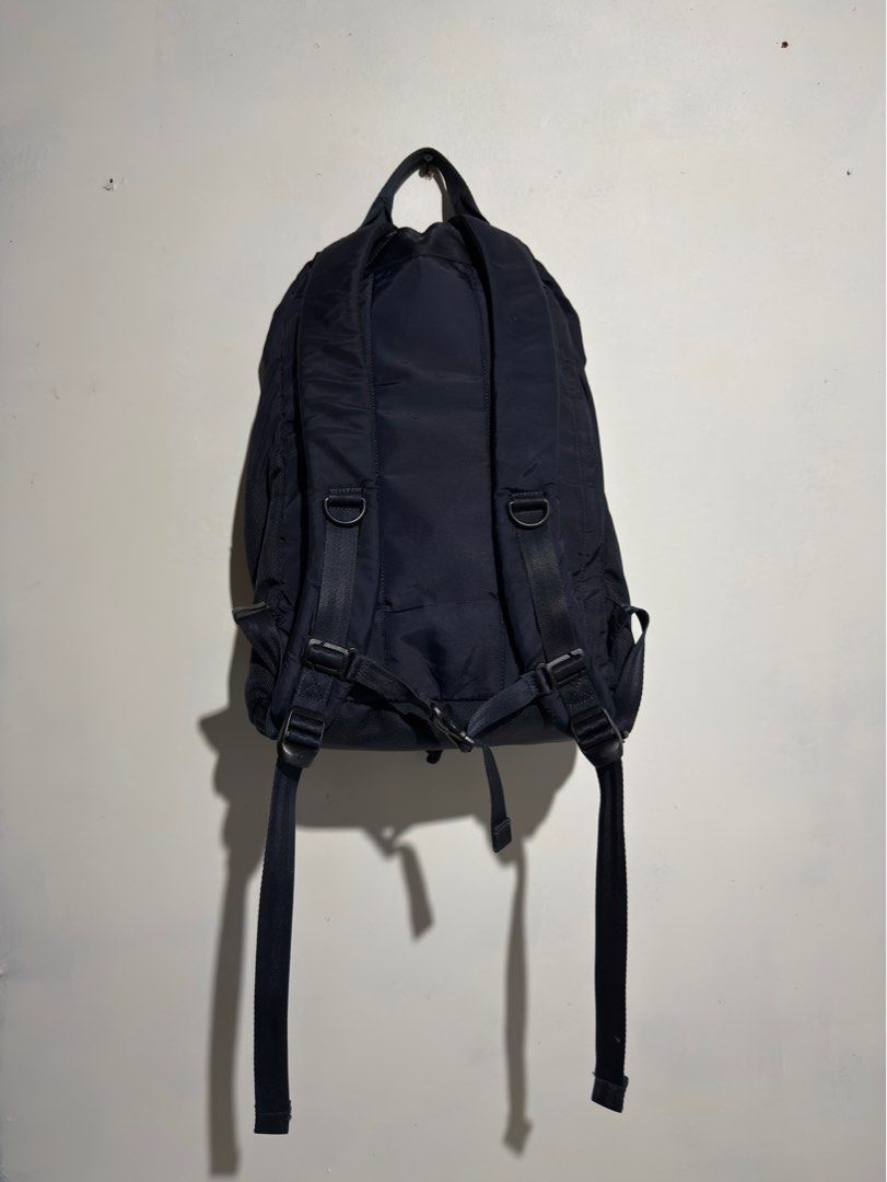 PORTER Klunkerz Daypack (Rucksack Backpack) (Category: Backpacks) located in Bulacan. Submitted by streethrifter (Listing ID 1401787755, Image 2). Description: 🎒 PORTER Klunkerz Daypack (Rucksack Backpack) 📏 Size: • Length: 17 inches • Width: 13 inches • Expandable: Up to 1–5.5 inches ✨ Condition: • Rating: 9/10 (Excellent overall) • Color: Dark bluish tone — rich and clean • Minor flaw: Slight fading on hardware only • No scratches — looks lik