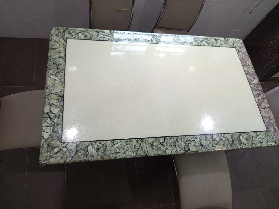 Rectangular Dining Table with Stone Border (Category: Tables & Sets) located in Seremban. Submitted by Avee1 (Listing ID 1401790390, Image 2). Description: - Rectangular dining table - Cream-colored center - Decorative stone border - Glossy finish - Modern design - Sturdy and stylish.