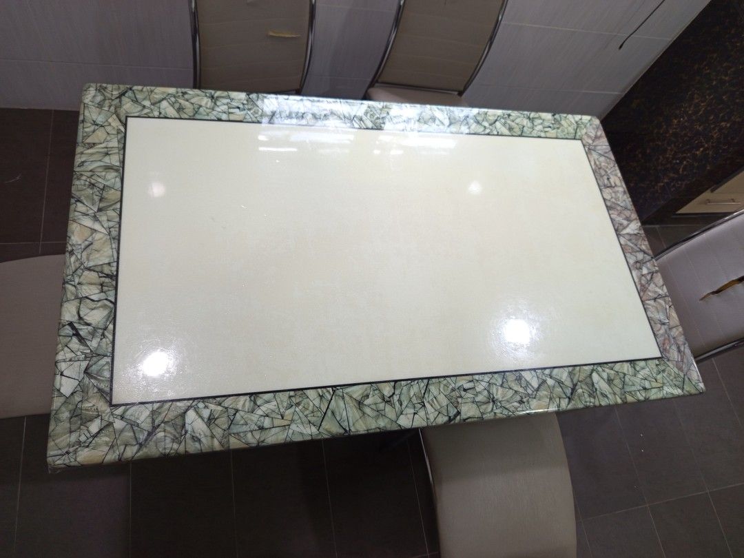 Rectangular Dining Table with Stone Border (Category: Tables & Sets) located in Seremban. Submitted by Avee1 (Listing ID 1401790390, Image 1). Description: - Rectangular dining table - Cream-colored center - Decorative stone border - Glossy finish - Modern design - Sturdy and stylish.