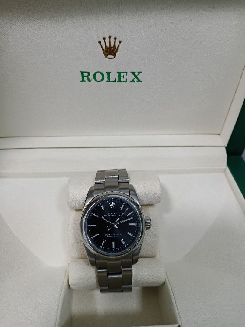 Rolex Oyster Perpetual Watch (Category: Luxury Watches) located in Manila. Submitted by luxuriouslife77 (Listing ID 1401834182, Image 1). Description: For Sale Pre Loved Rolex Oyster Perpetual watch Ladies 28mm Black dial Stainless steel bracelet Good as new Seldom used only for special occasions S/C close to O/G a/r/f Bought in Istanbul 2024 Comes with the original box, warranty card, and hang tag. Pasig City.