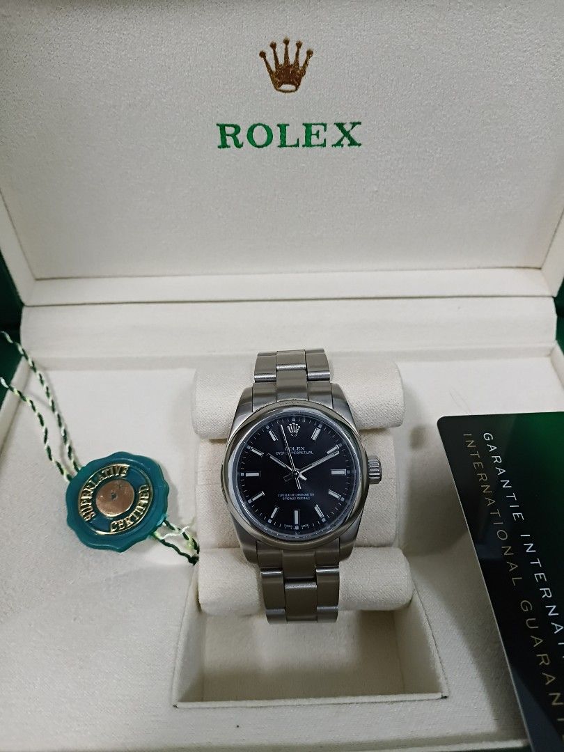 Rolex Oyster Perpetual Watch (Category: Luxury Watches) located in Manila. Submitted by luxuriouslife77 (Listing ID 1401834182, Image 2). Description: For Sale Pre Loved Rolex Oyster Perpetual watch Ladies 28mm Black dial Stainless steel bracelet Good as new Seldom used only for special occasions S/C close to O/G a/r/f Bought in Istanbul 2024 Comes with the original box, warranty card, and hang tag. Pasig City.