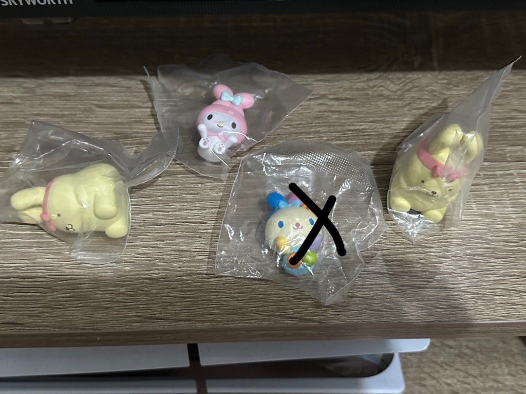 Sanrio Characters (pompompurin, my melody) 250 each (Category: Designer & Blind Box Toys) located in Marikina City. Submitted by hiy_cutiee (Listing ID 1401795465, Image 2). Description: - Each figure individually wrapped - From a gachapon machine.