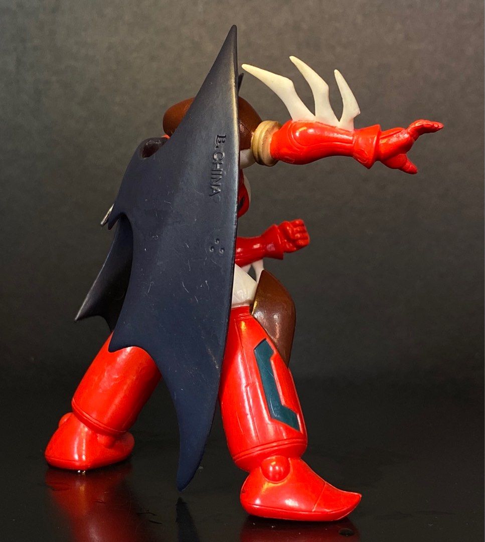 Shin getter getter robo Bandai (Category: Figurines & Statues) located in Agoo. Submitted by collect12 (Listing ID 1401746864, Image 2). Description: - Getter 1 action figure - Features a red, white, and brown color scheme - Includes black wings - Posed in a dynamic stance - Detailed paintwork and design - Made in China.