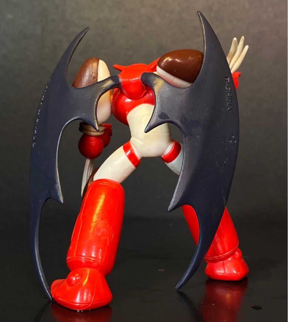 Shin getter getter robo Bandai (Category: Figurines & Statues) located in Agoo. Submitted by collect12 (Listing ID 1401746864, Image 3). Description: - Getter 1 action figure - Features a red, white, and brown color scheme - Includes black wings - Posed in a dynamic stance - Detailed paintwork and design - Made in China.
